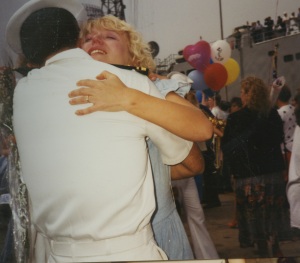 Leah giving me an emotional welcome home hug after my ship's Gulf War deployment.