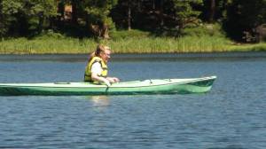 Elowyn canoeing on the lake