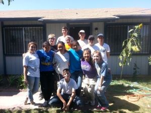 Jason serving with World Changer teens helping repair house in SE Fresno